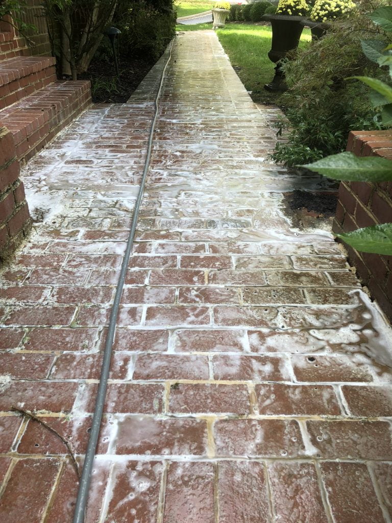 brick sidewalk cleaning - a brick wash without high pressure and using the right cleaning chemicals